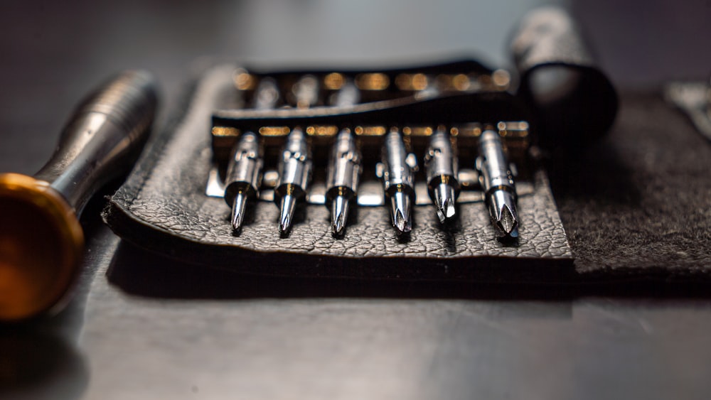 Homeowner repairing cabinetry hardware